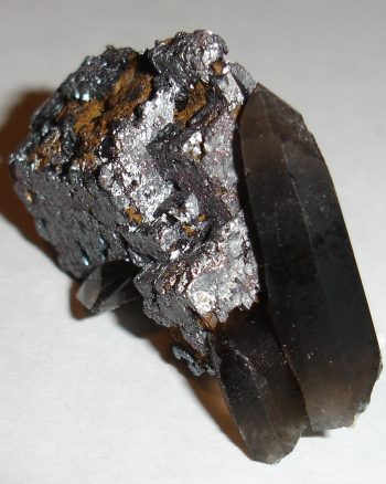 Smoky quartz and hematite (after siderite?) pseudomorph