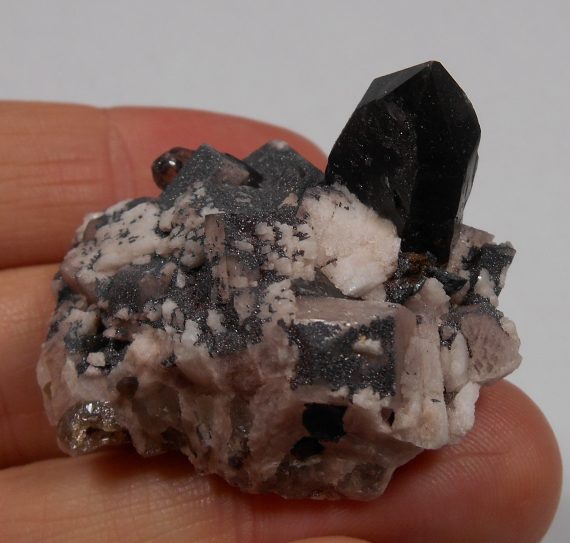 Smoky quartz, microcline, albite, and specular hematite
