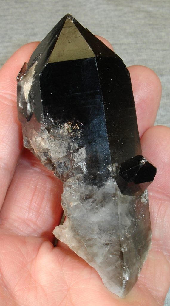 Large smoky quartz with smaller crystal
