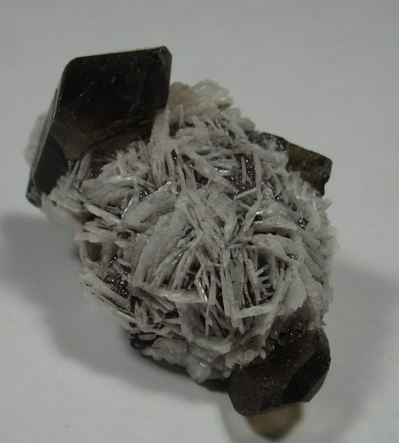 Smoky quartz, clevelandite, amazonite, and specular hematite