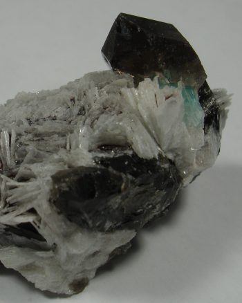 Smoky quartz, clevelandite, amazonite, and specular hematite