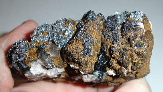 Hematite (and limonite) pseudomorph and smoky quartz