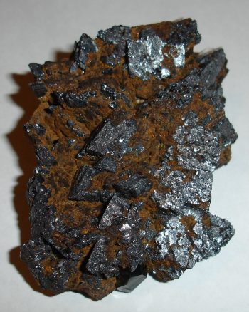 Hematite (and limonite) pseudomorph and smoky quartz