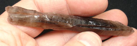 Long, tabular smoky quartz crystal