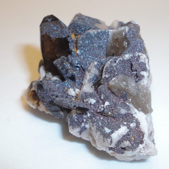 Smoky quartz, microcline (Manebach twin), hematite pseudomorph, and specular hematite