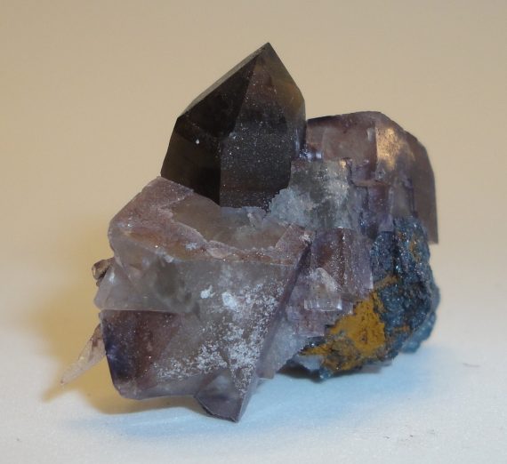 Fluorite, smoky quartz, and hematite pseudomorph.