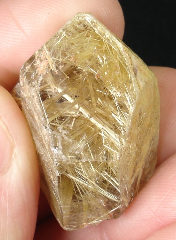Golden rutile in clear quartz