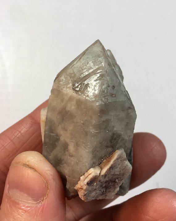 Smoky quartz with secondary growth