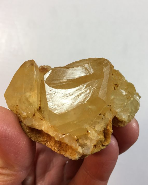 Honey colored calcite crystal cluster
