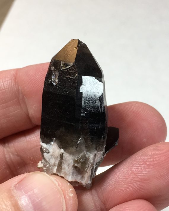 Smoky quartz - main crystal termination was broken in the pocket and "healed" with clear quartz.