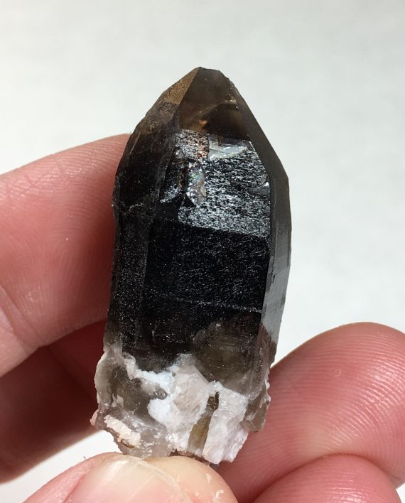 Smoky quartz - main crystal termination was broken in the pocket and "healed" with clear quartz.