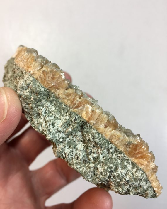 Calcite crystals on stilbite