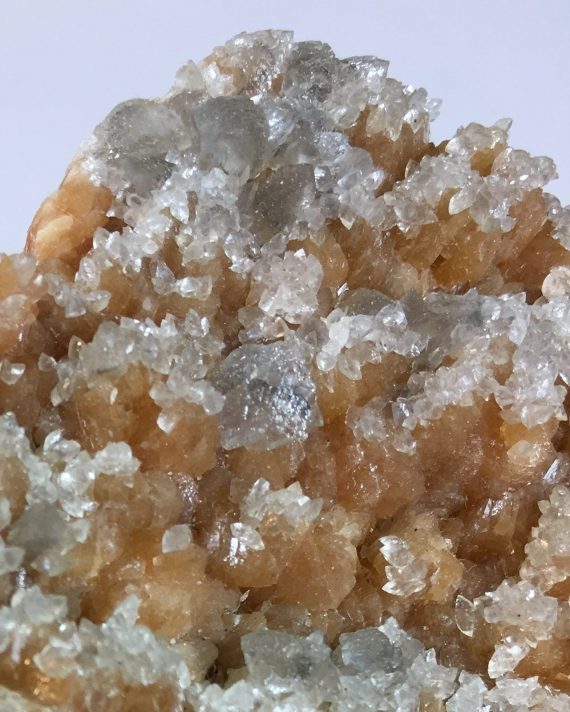 Calcite crystals on stilbite
