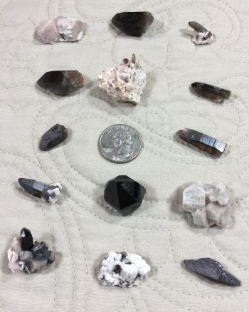 smoky quartz, microcline, albite, and specular hematite