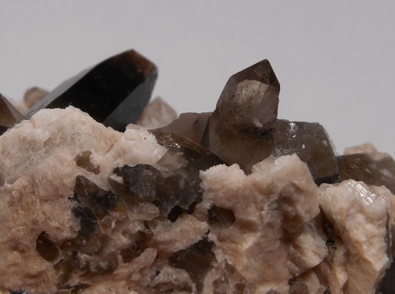 Smoky quartz and microcline on matrix