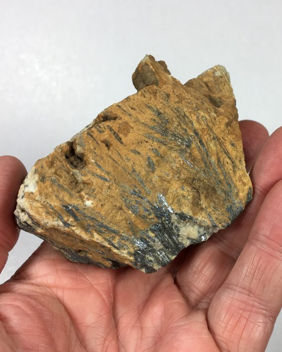 Stibnite in calcite and quartz