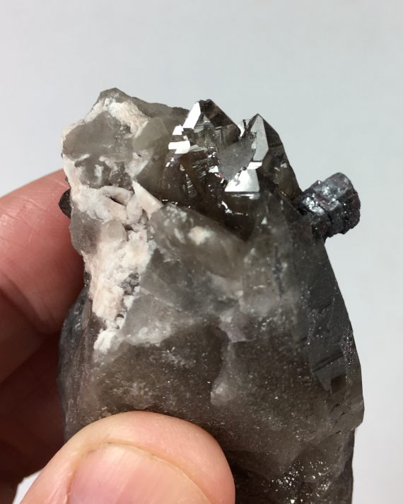 Smoky quartz and hematite pseudomorph