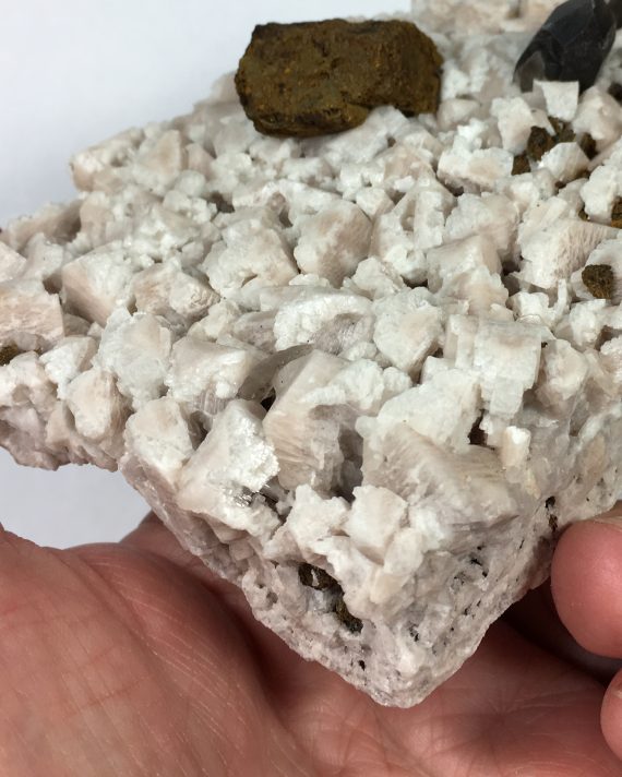 smoky quartz, microcline, albite, and limonite pseudomorph