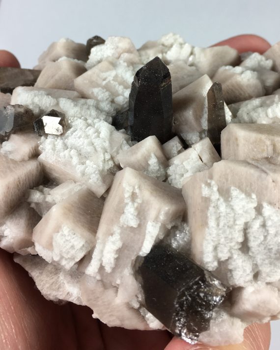 Microcline, albite, and smoky quartz