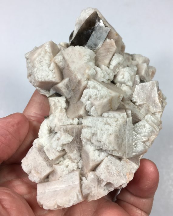 Microcline, albite, and smoky quartz 