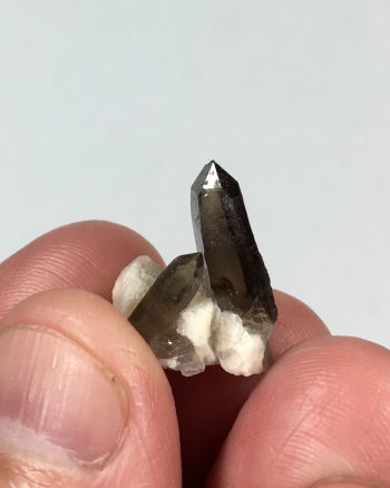 Smoky quartz crystals on microcline
