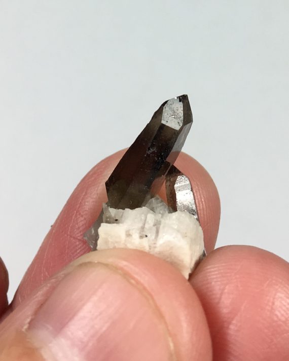 Smoky quartz crystals on microcline