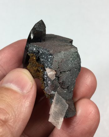 Hematite pseudomorph (after siderite?) and smoky quartz