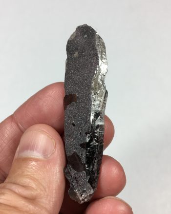 Smoky Quartz coated with specular Hematite