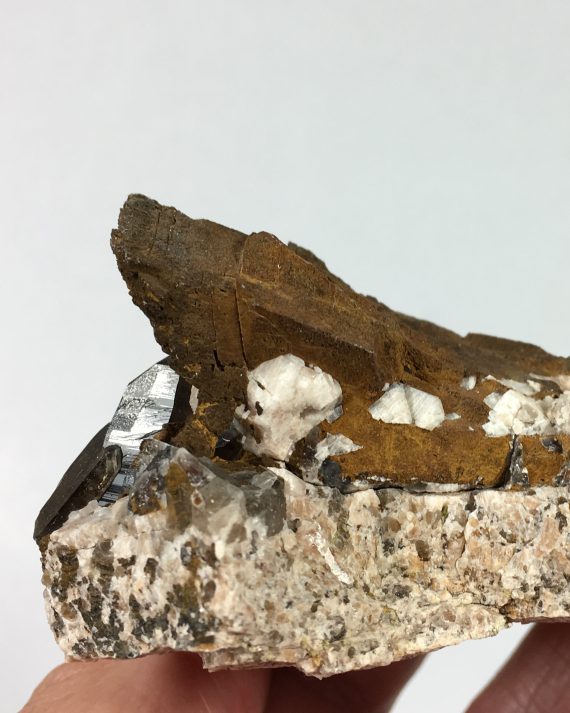 Limonite pseudomorph (after Siderite?), Smoky Quartz, and Microcline