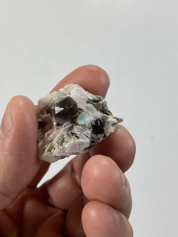 Smoky quartz, clevelandite, and small amazonite crystals