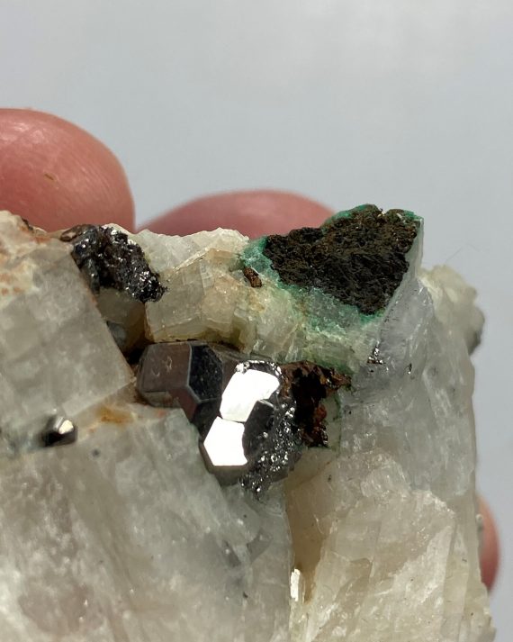 Multiple Carrolite crystals in Calcite