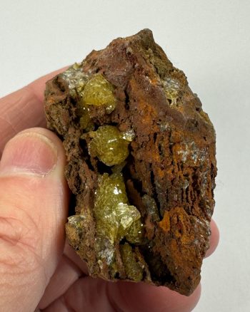 Light yellow adamite crystals, which fluoresce green under longwave UV