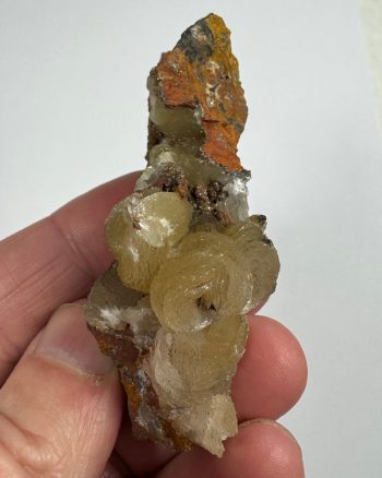 Adamite crystals on matrix. Fluoresces light orange under longwave uv